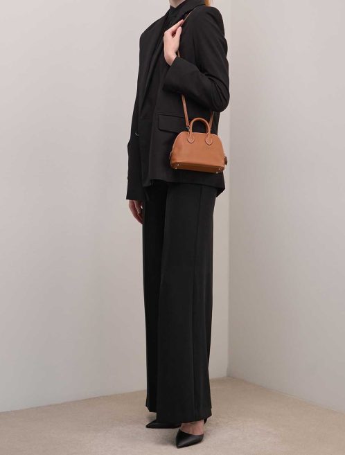 Hermès Bolide Mini Evercolor Gold on Model | Sell your designer bag