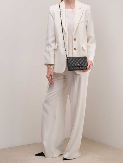 Chanel Wallet On Chain Caviar Black on Model | Sell your designer bag