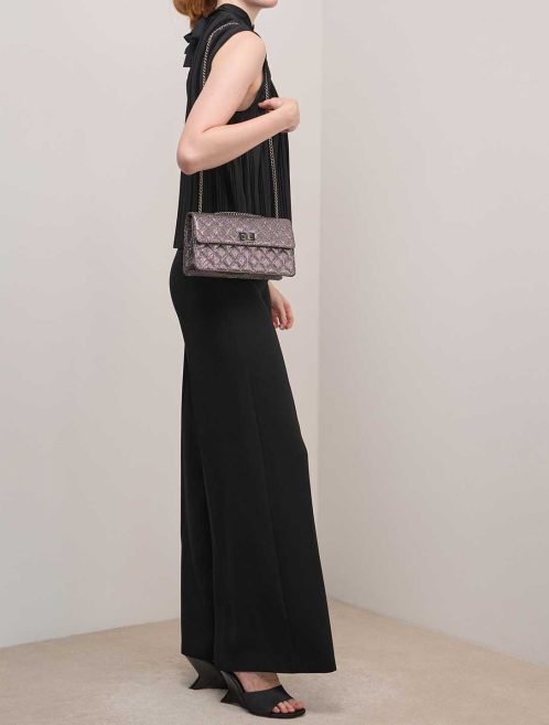 Chanel 2.55 Reissue 226 Fabric Metallic Grey on Model | Sell your designer bag