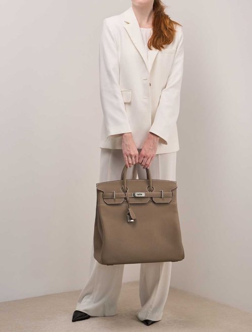 Hermès Haut à Courroies 40 Togo Étoupe on Model | Sell your designer bag