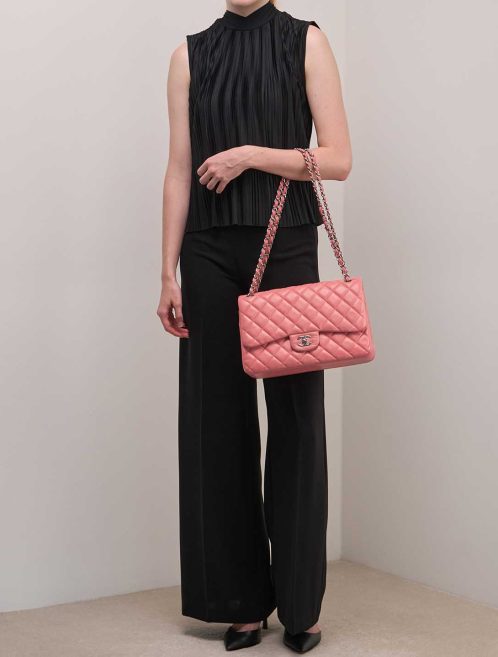 Chanel Timeless Jumbo Lamb Pink on Model | Sell your designer bag