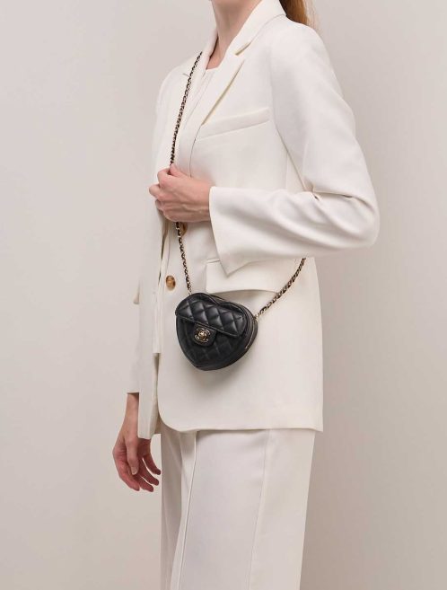 Chanel Timeless Heart Small Lamb Black on Model | Sell your designer bag