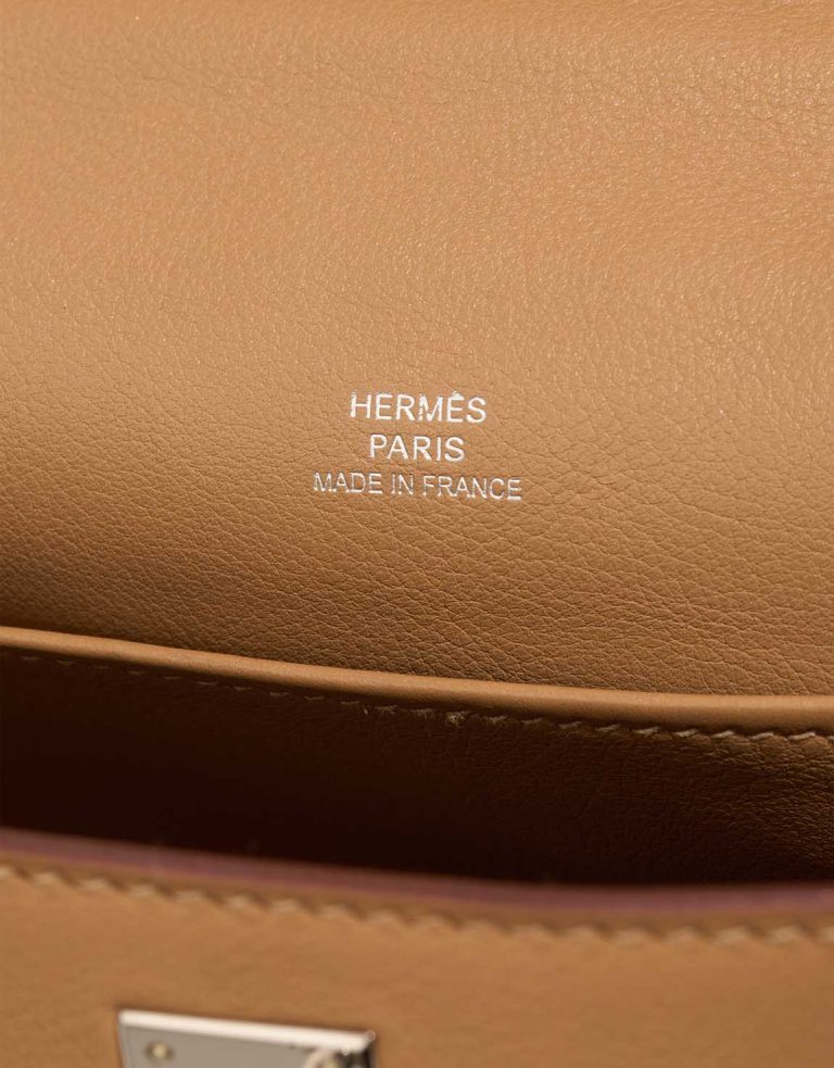 Hermès Kelly Pochette Swift Biscuit Logo | Sell your designer bag