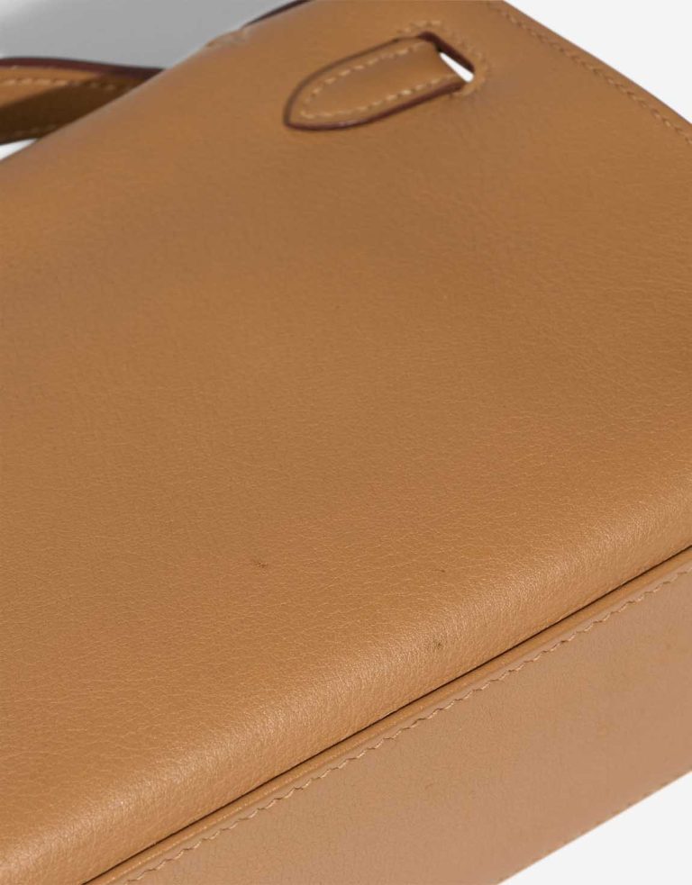 Hermès Kelly Pochette Swift Biscuit Signs of wear | Sell your designer bag