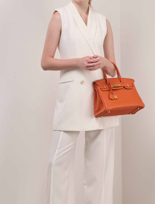 Hermès Birkin 30 Togo Orange on Model | Sell your designer bag