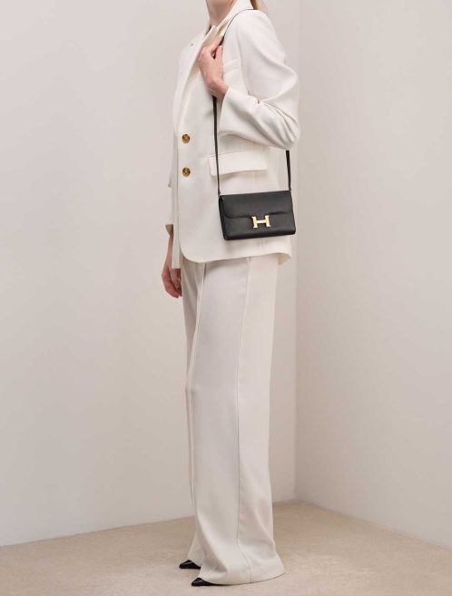 Hermès Constance To Go Epsom Black on Model | Sell your designer bag