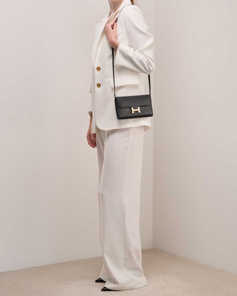 Hermès Constance To Go Epsom Black on Model | Sell your designer bag