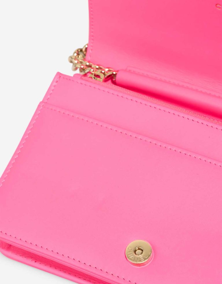 Chanel Boy Wallet On Chain Patent Hot Pink Signs of wear | Sell your designer bag