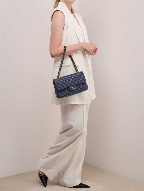 Chanel Timeless Medium Caviar Blue on Model | Sell your designer bag