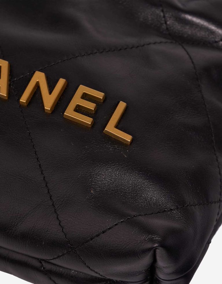 Chanel 22 Mini Lamb Black Signs of wear | Sell your designer bag