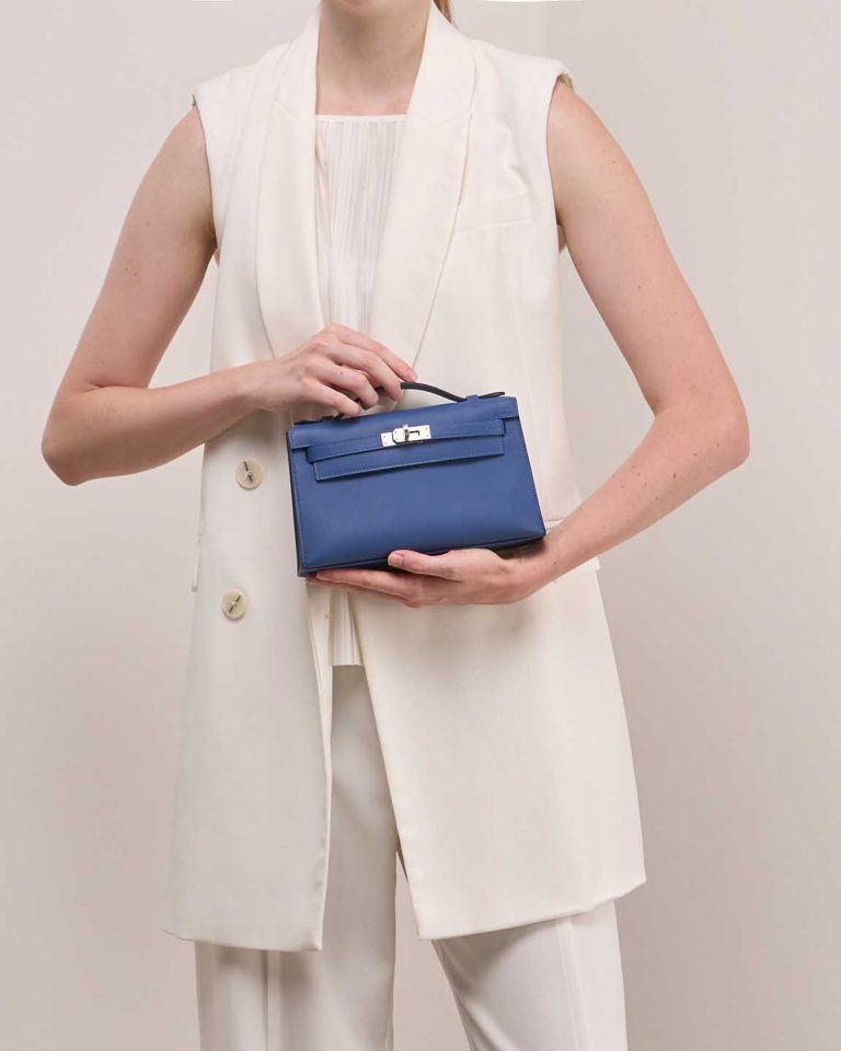 Hermès Kelly Pochette Swift Bleu Tie Front | Sell your designer bag