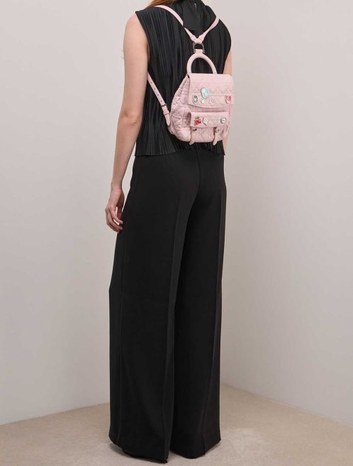 Dior Backpack Small Lamb Pink on Model | Sell your designer bag