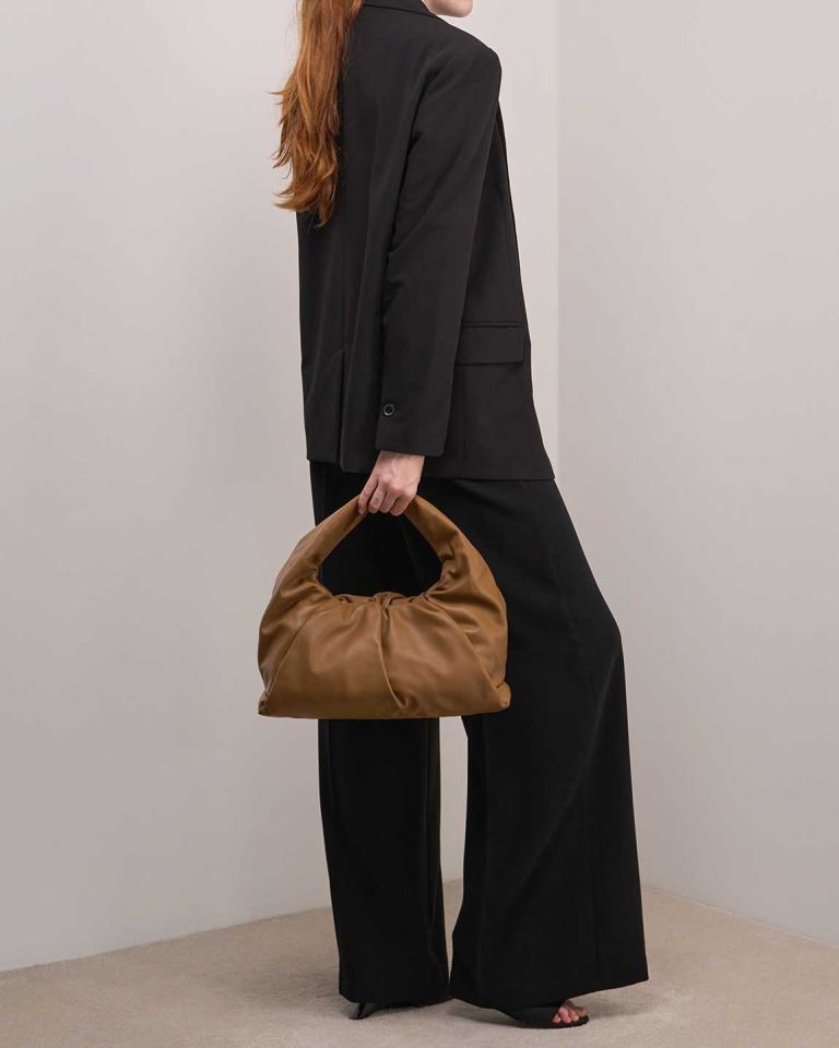 Bottega Veneta Pouch Large Lamb Brown on Model | Sell your designer bag