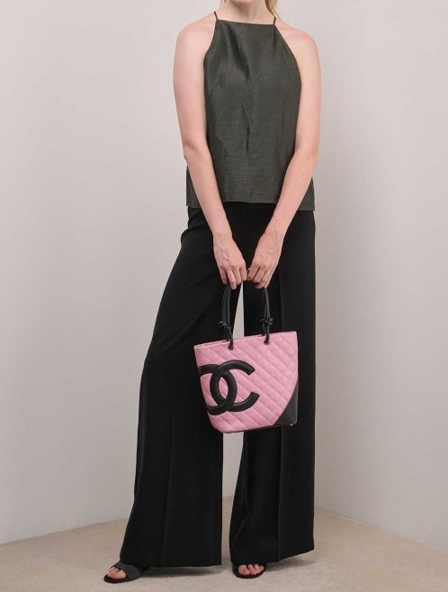 Chanel Cambon Tote Bag Small Lamb Pink / Black on Model | Sell your designer bag