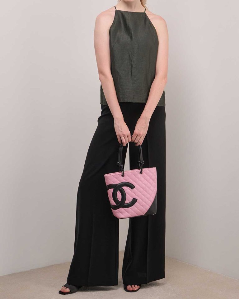 Chanel Cambon Tote Bag Small Lamb Pink / Black on Model | Sell your designer bag