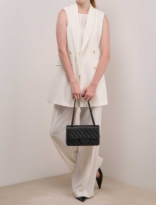 Chanel Timeless Medium Lamb Black on Model | Sell your designer bag