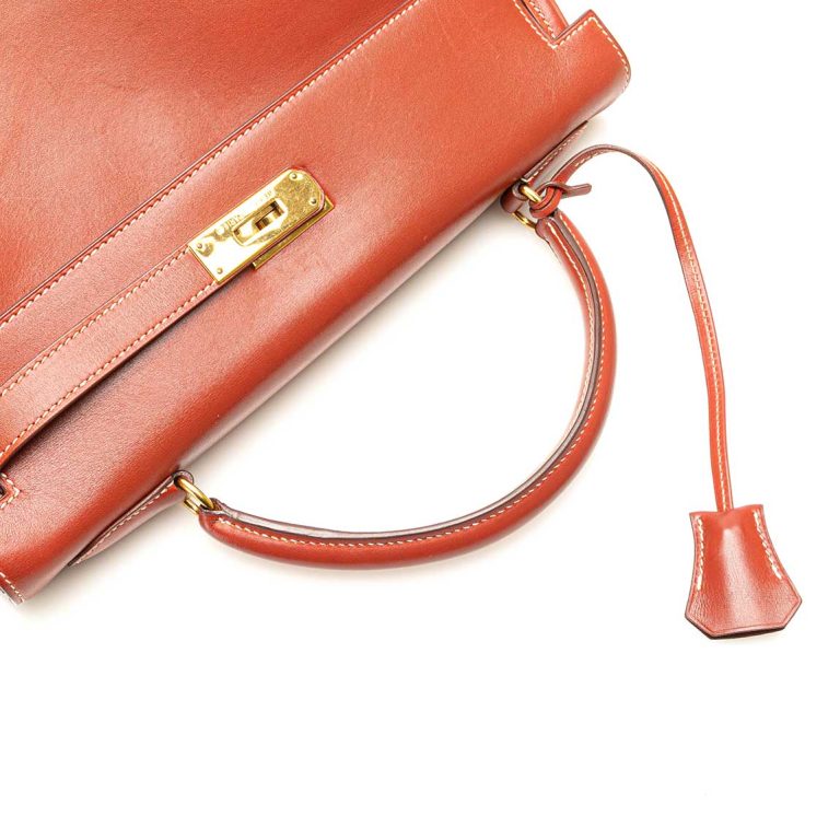 Hermès Kelly 32 Box Calf Brique Signs of wear | Sell your designer bag