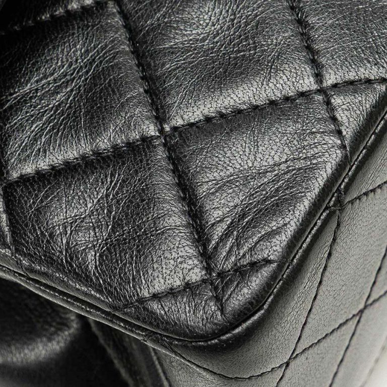 Chanel Timeless Medium Lamb Black Signs of wear | Sell your designer bag