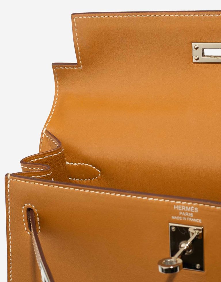 Hermès Kelly 25 Sable Butler Naturel Signs of wear | Sell your designer bag