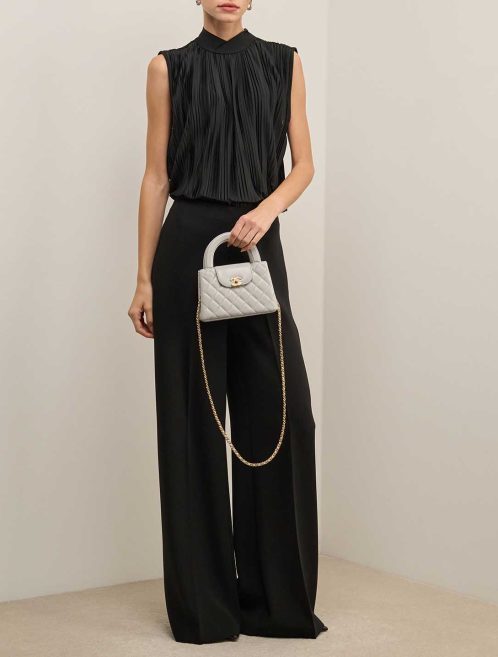 Chanel Kelly Medium Lamb Grey on Model | Sell your designer bag
