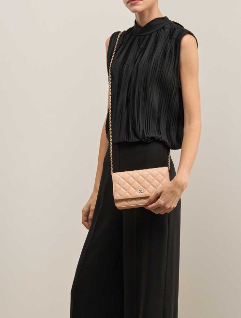 Chanel Timeless Wallet On Chain Caviar Beige on Model | Sell your designer bag