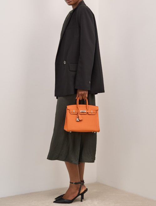 Hermès Birkin 25 Togo Orange on Model | Sell your designer bag