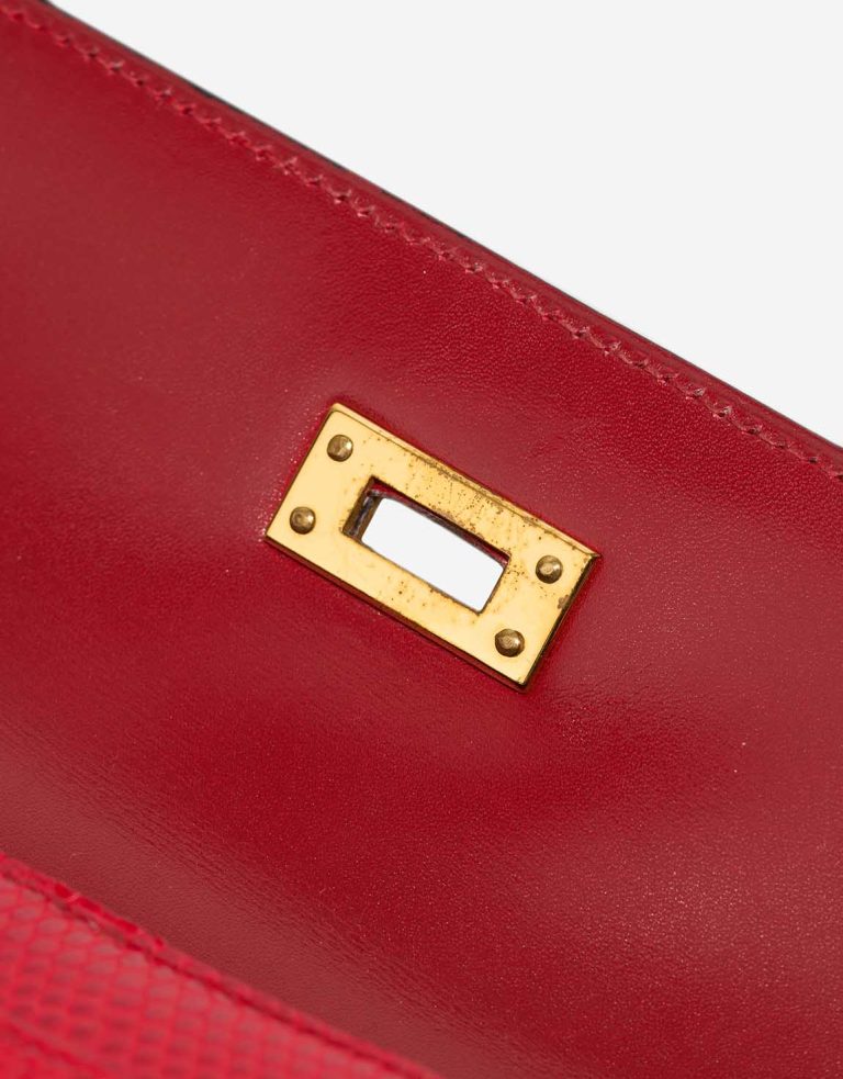 Hermès Kelly Mini Lizard Rouge Vif Signs of wear | Sell your designer bag