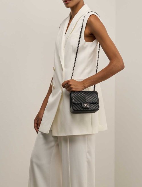 Chanel Timeless Mini Square Lamb Black on Model | Sell your designer bag