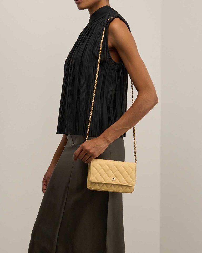 Chanel Wallet On Chain Caviar Yellow on Model | Sell your designer bag
