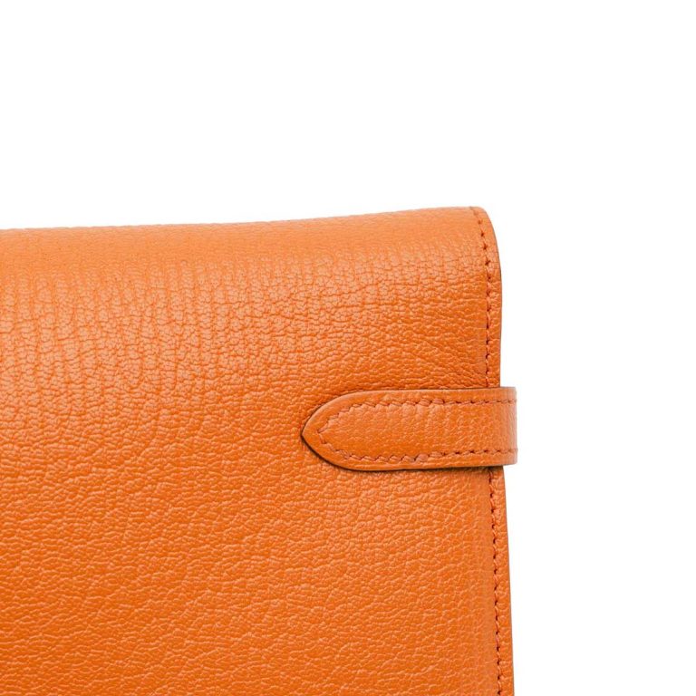 Hermès Kelly Long Wallet Chèvre Mysore Orange H Signs of wear | Sell your designer bag