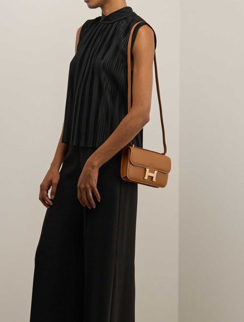 Hermès Constance Elan Epsom Gold on Model | Sell your designer bag