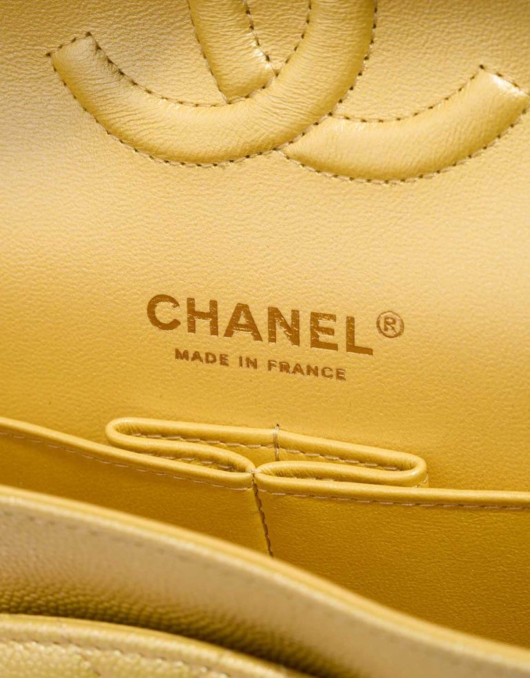 Chanel Timeless Medium Caviar Yellow Logo | Sell your designer bag