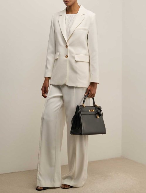 Hermès Kelly 35 Box Black on Model | Sell your designer bag