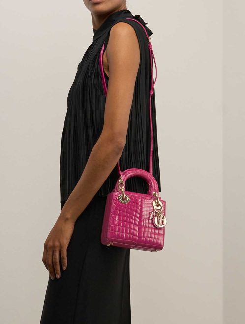 Dior Lady Micro Crocodile Neon Pink on Model | Sell your designer bag