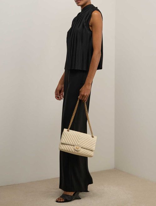 Chanel 2.55 Reissue 226 Crinkled Calf Off White on Model | Sell your designer bag