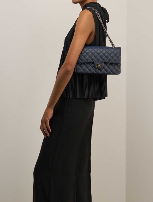 Chanel Timeless Medium Caviar Blue on Model | Sell your designer bag