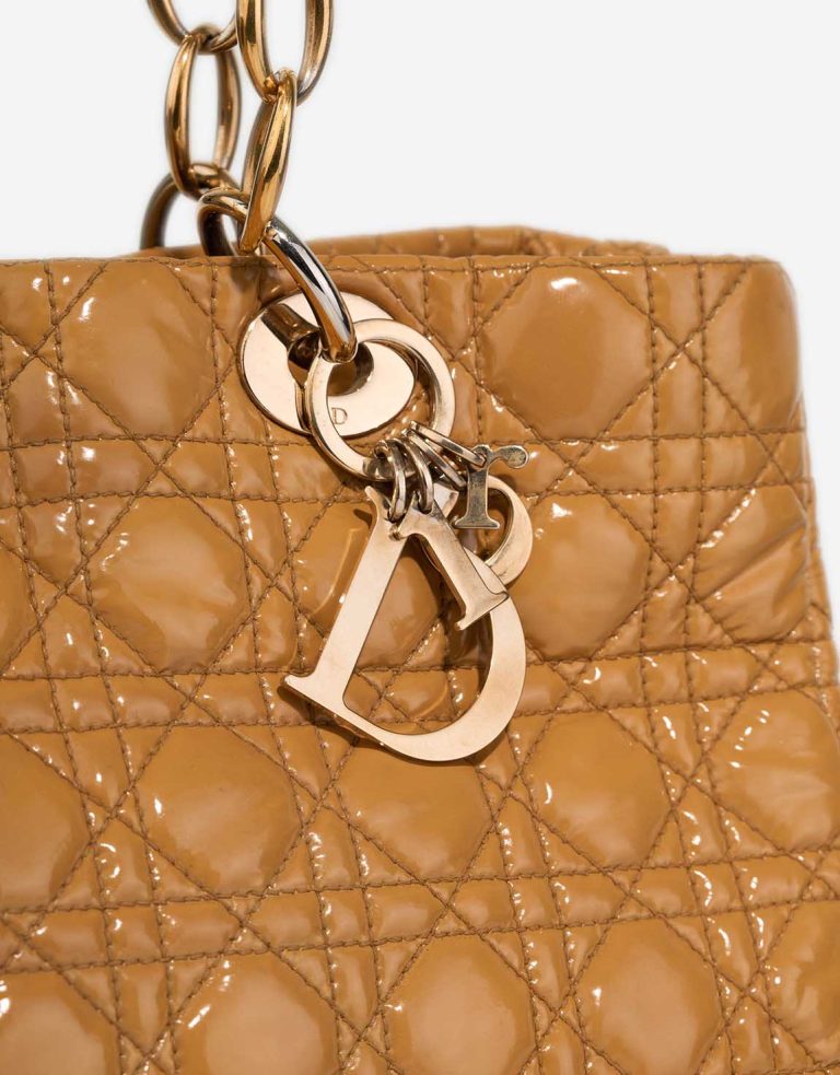 Dior Shopper Medium Patent Mustard Closing System | Sell your designer bag