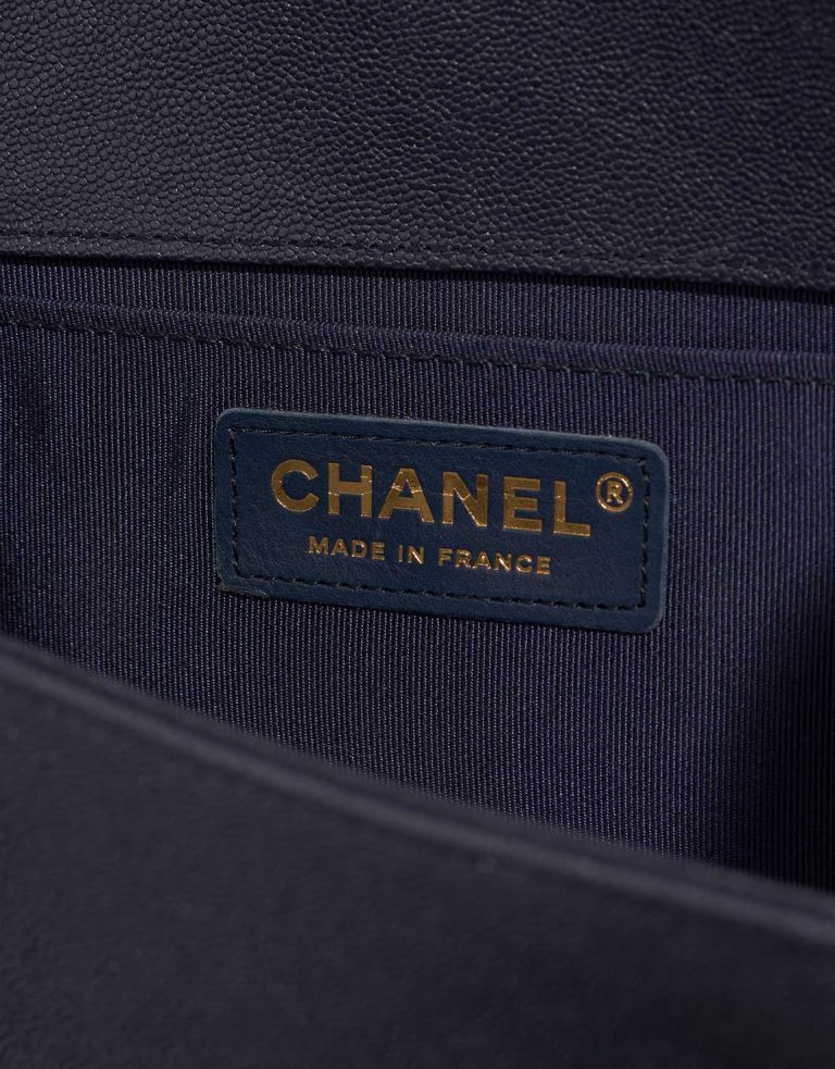 Chanel Boy Old Medium Caviar Dark Blue Logo | Sell your designer bag