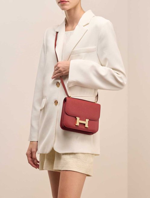 Hermès Constance 18 Epsom Rouge Venitien on Model | Sell your designer bag