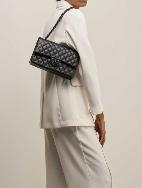 Chanel Timeless Medium Lamb Black on Model | Sell your designer bag