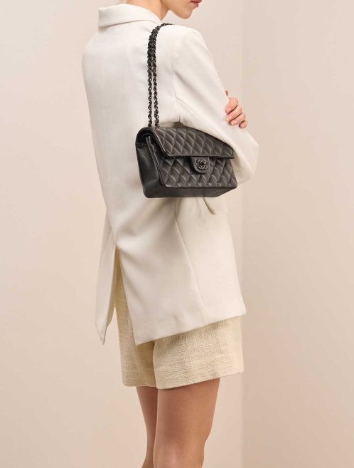 Chanel Timeless Small Lamb Black on Model | Sell your designer bag