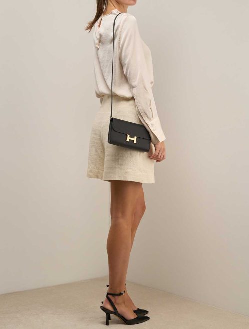 Hermès Constance To Go Epsom Black on Model | Sell your designer bag