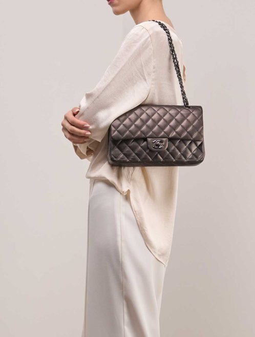 Chanel Timeless Medium Lamb Dark Grey on Model | Sell your designer bag