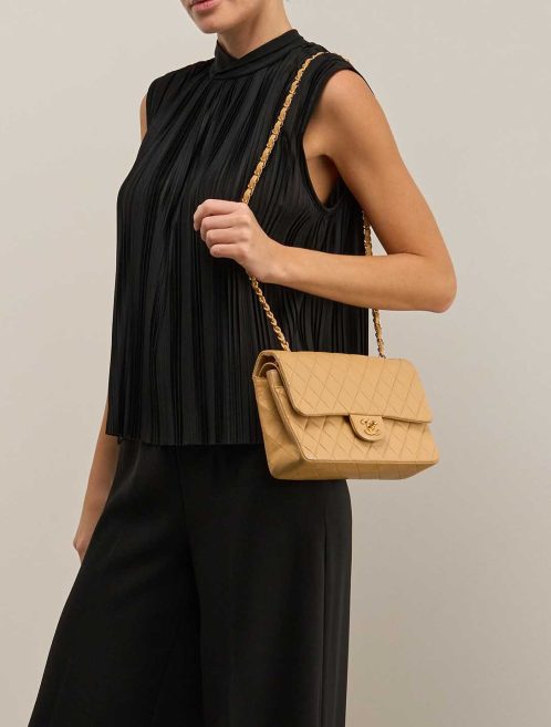 Chanel Timeless Medium Lamb Beige on Model | Sell your designer bag