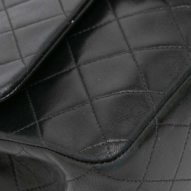 Chanel Timeless Medium Lamb Black Signs of wear | Sell your designer bag