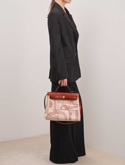 Hermès Herbag 31 Toile H / Vache Hunter Écru / Cuivre on Model | Sell your designer bag