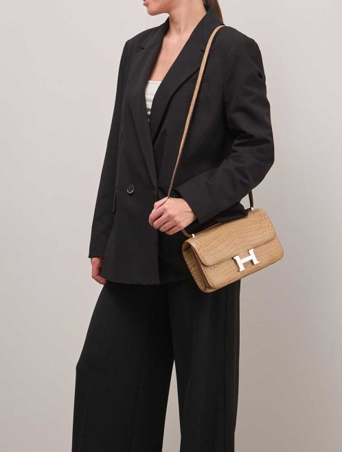 Hermès Constance Elan Niloticus Crocodile Gris Cendre on Model | Sell your designer bag