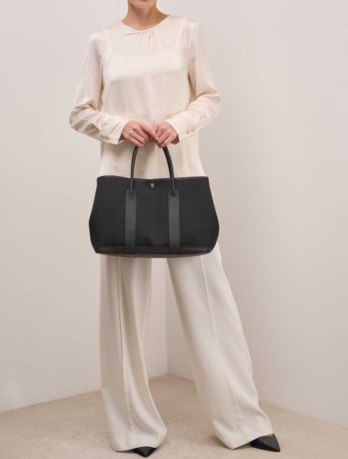 Hermès Garden Party 36 Veau Négonda / Toile Black on Model | Sell your designer bag