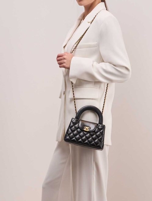 Chanel Kelly Medium Lamb Black on Model | Sell your designer bag