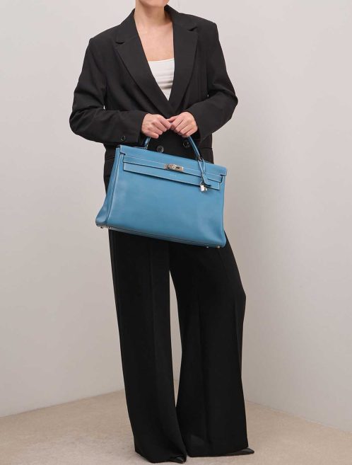 Hermès Kelly 40 Swift Bleu Jean on Model | Sell your designer bag